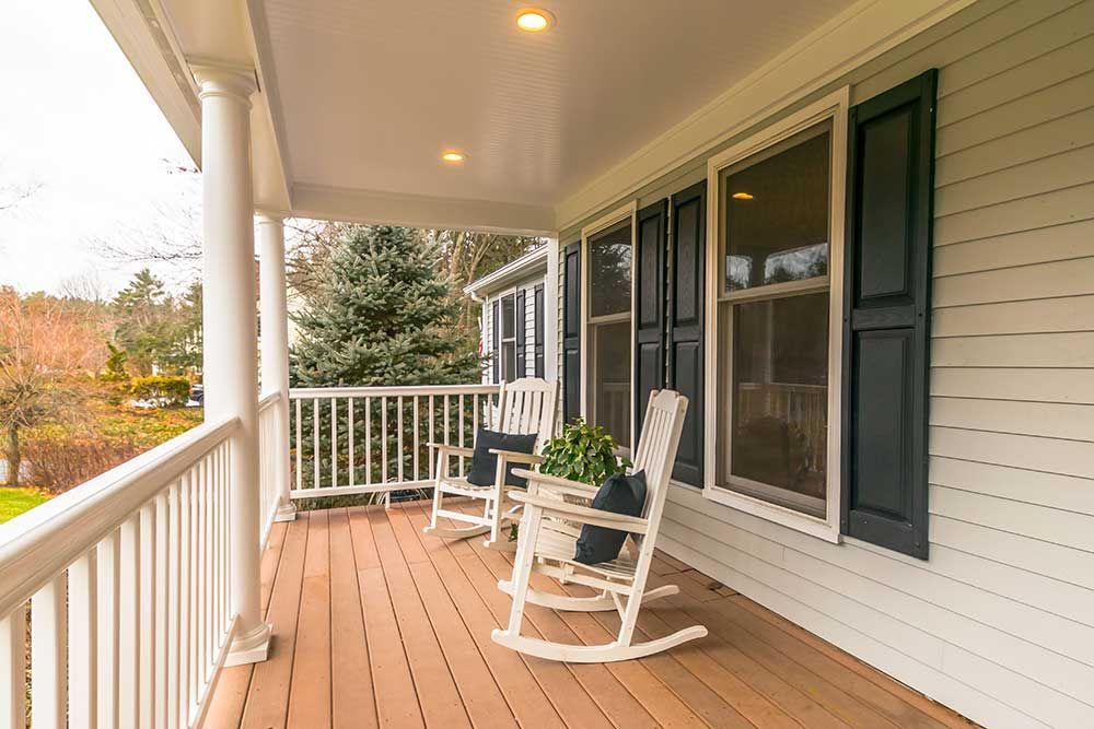 Rocking chairs on a porch
