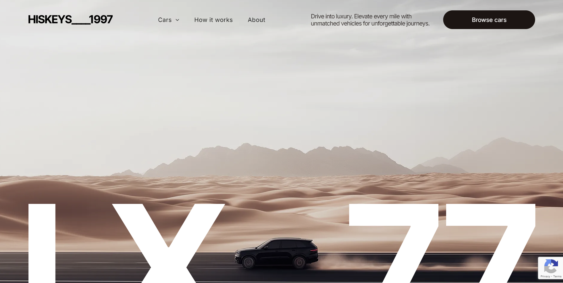 Black SUV driving on a road through a desert landscape.