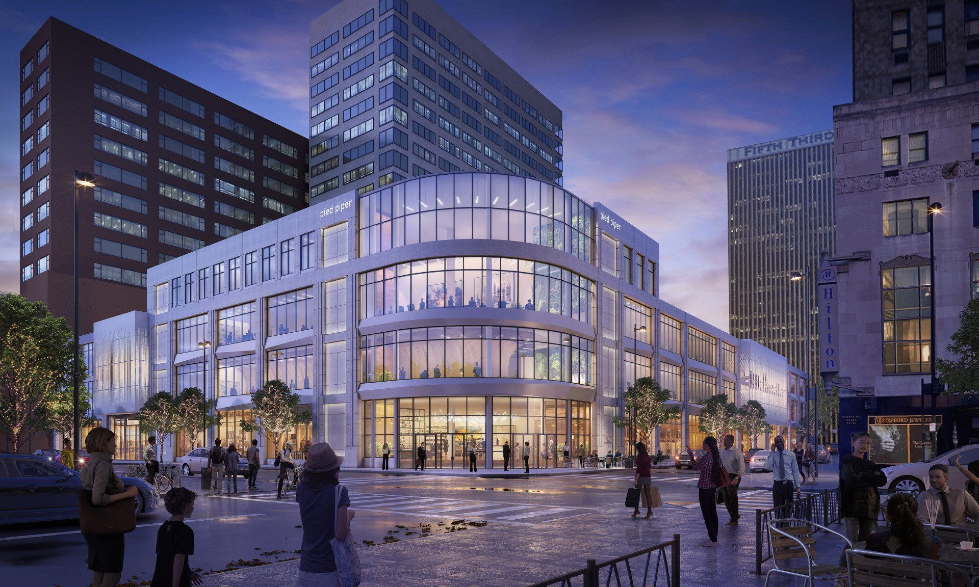 An artist 's impression of a large building in a city at night.