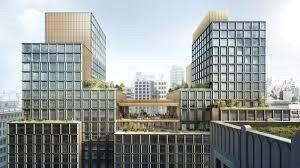 An artist 's impression of a large building with a green roof.