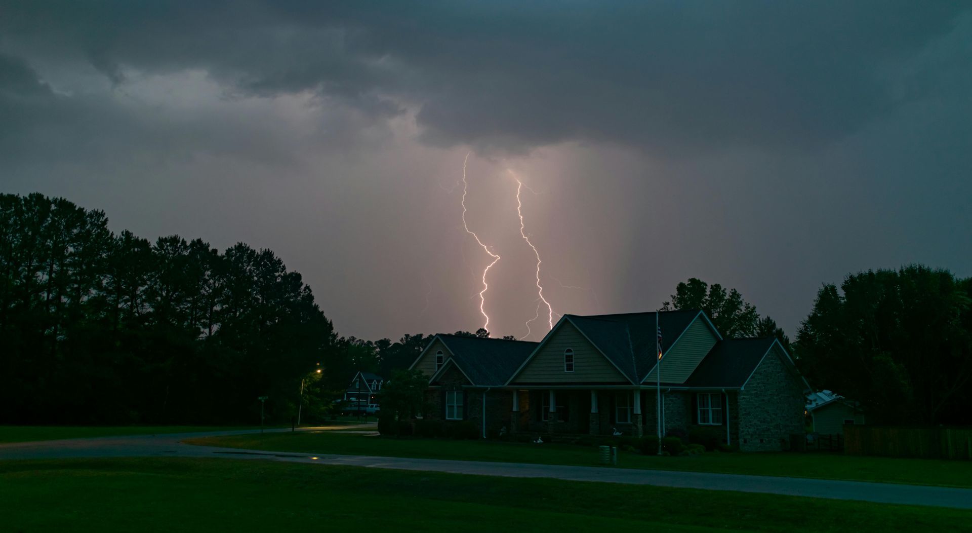Lightning strikes during thunderstorm close to house Granville OH