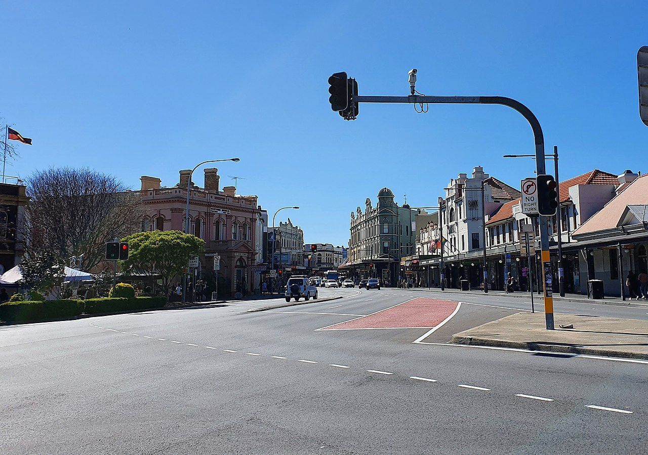 HSC Biology & Chemistry Success in Newtown Intersection of King Street and Enmore Road in Newtown, highlighting the Inner West community served by Tutorio Tutoring senior Biology and Chemistry HSC tutoring.