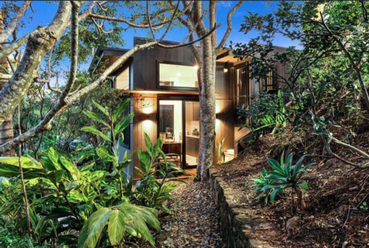 Brightly Lit Facade of a House Down a Garden Pathway — Brightway Lighting in Lismore, NSW