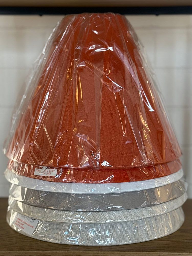 Stacked Orange, White, And Gray Lampshades — Brightway Lighting in Lismore, NSW