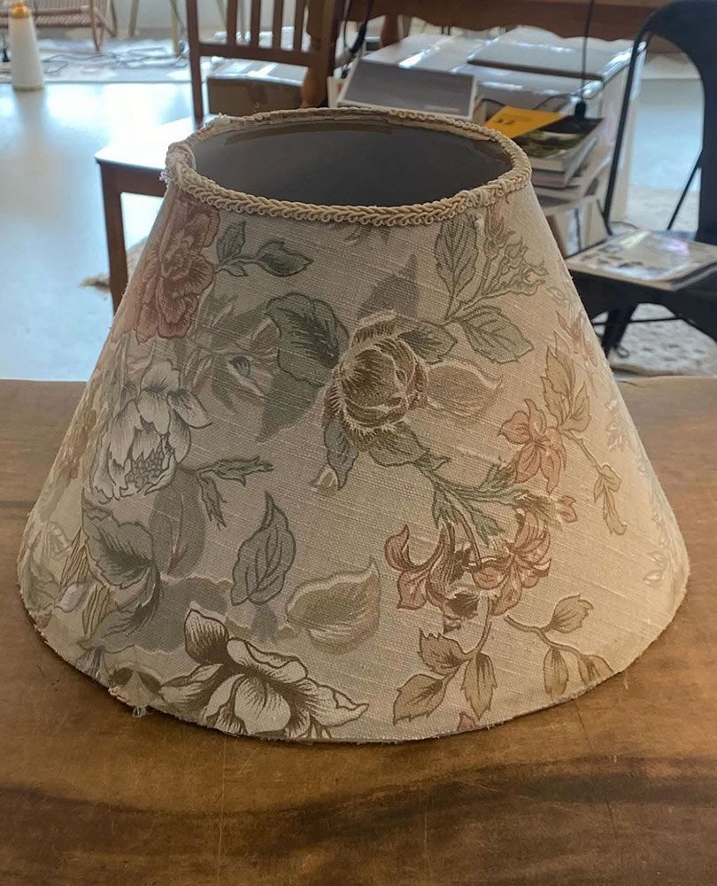 Floral Patterned Lampshade On A Wooden Table — Brightway Lighting in Lismore, NSW