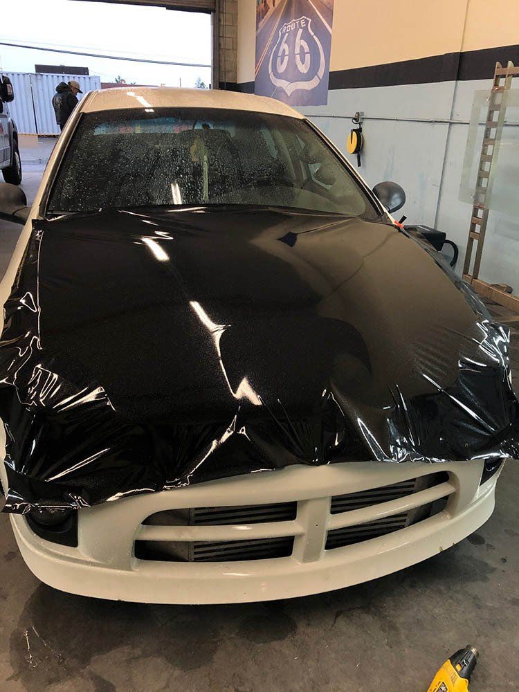 A Car During Wrapping Process | Upland, CA | SoCal Tint