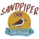 Home Page A logo for sandpiper inn lake bernice with a bird