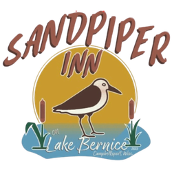 A logo for sandpiper inn lake bernice with a bird