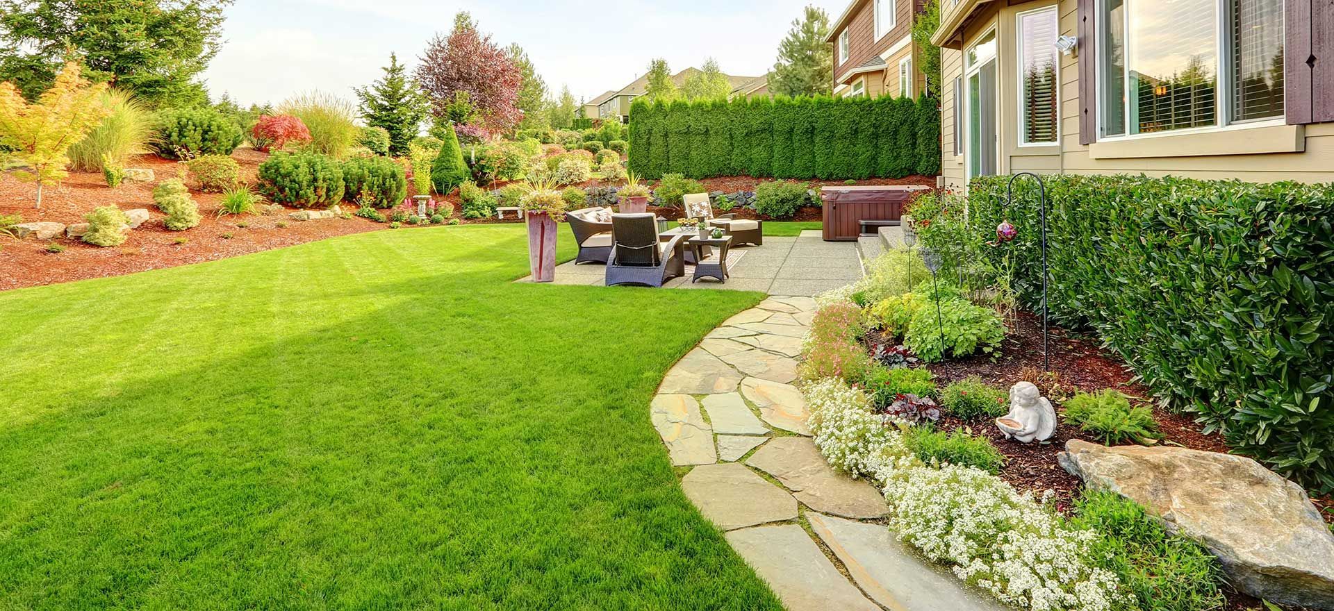 Luxury house exterior with impressive backyard landscape design
