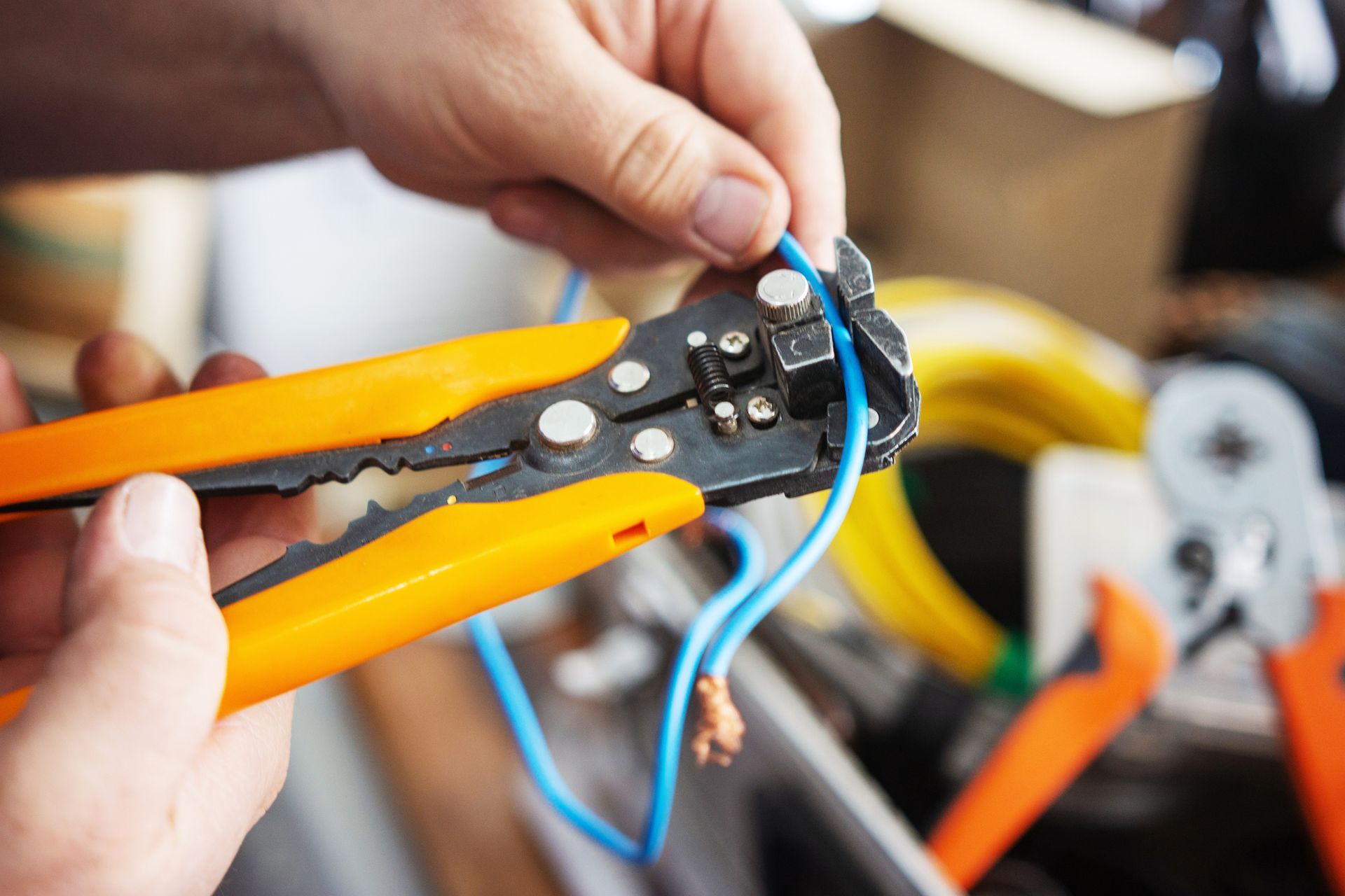 Stripping Blue Wire With Automatic Wire Stripper 
