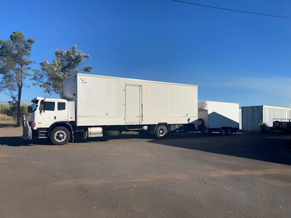 A Large White Truck is Parked in a Parking Lot — Dunford Removals in Gin Gin, QLD