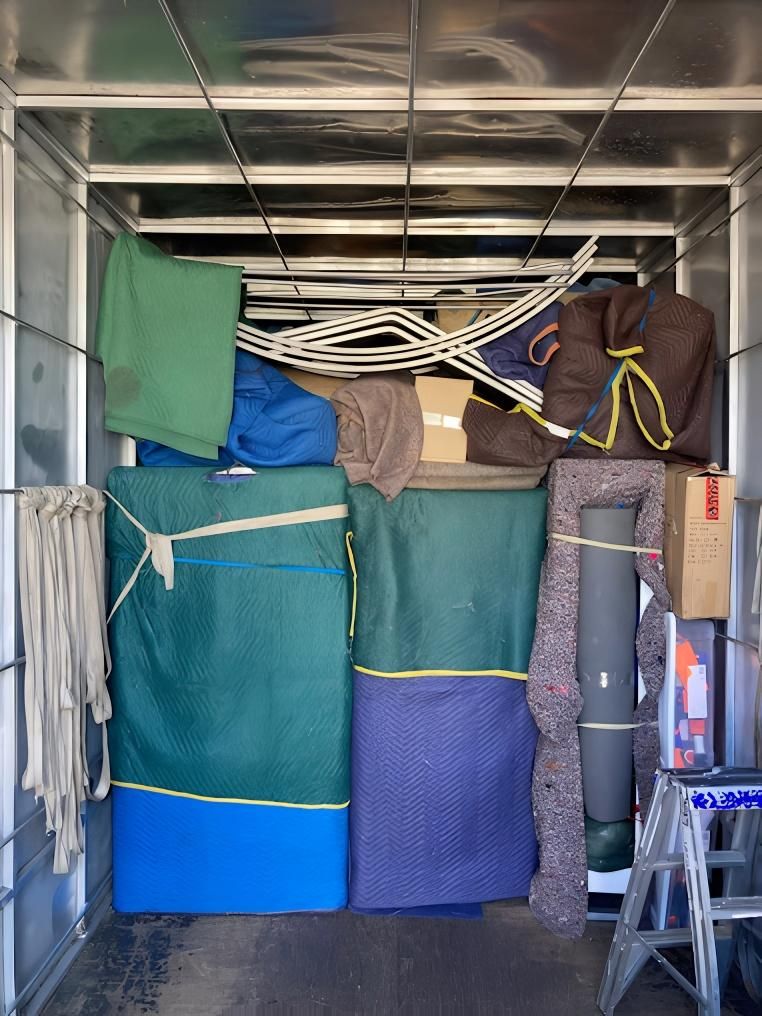 A Moving Truck Filled With Lots of Blankets and Boxes — Dunford Removals in Gayndah, QLD