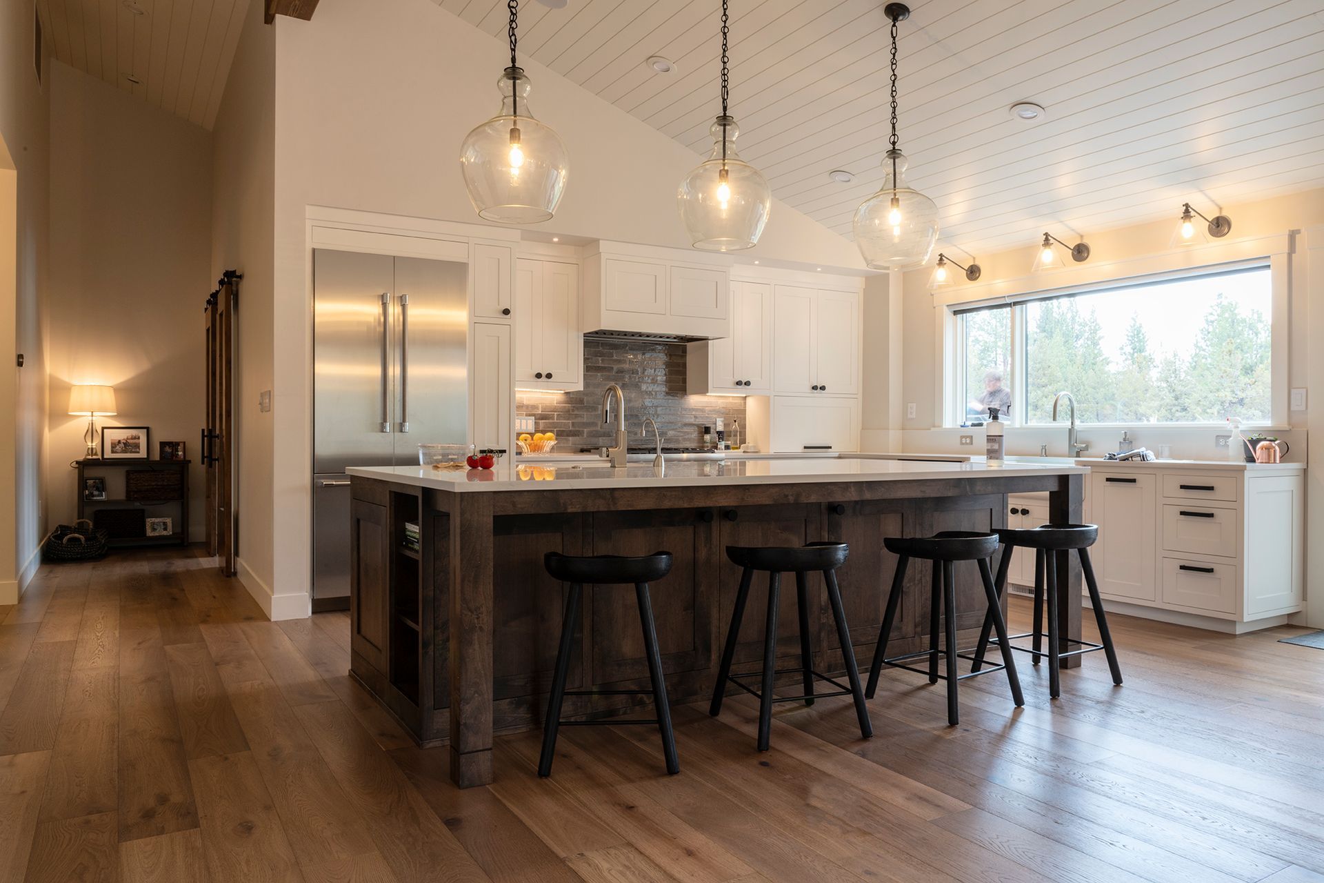 There is a large island in the middle of the kitchen.