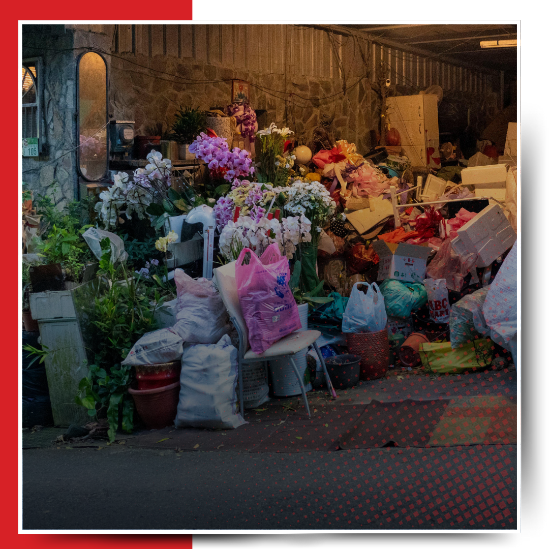 A pile of garbage outside the house.