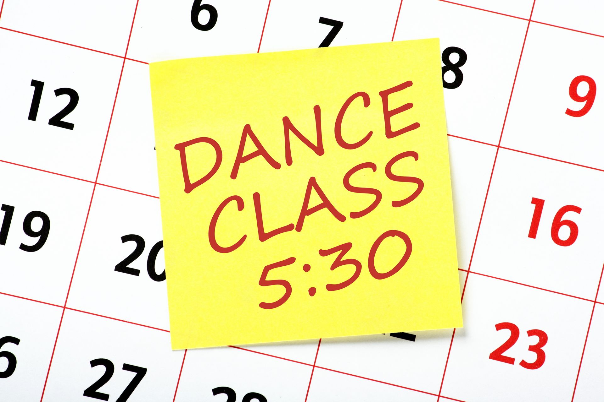 Yellow sticky note on a calendar reads “DANCE CLASS 5:30.”