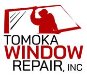A red and black logo for tomoka window repair inc