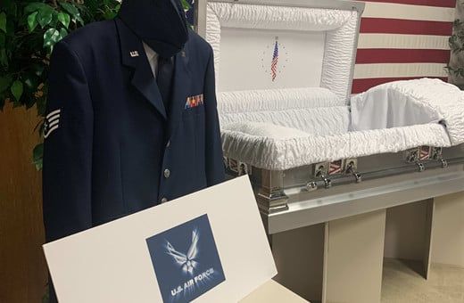 Several Photos of different caskets, gravestones, hearses, interior and exterior views of Kincannon Funeral Home in OK.