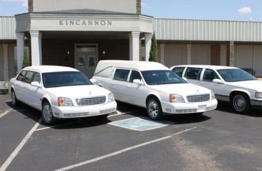 Several Photos of different caskets, gravestones, hearses, interior and exterior views of Kincannon Funeral Home in OK.