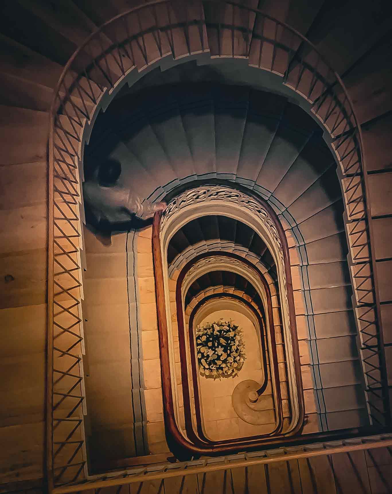 An aerial view of a spiral staircase in a building