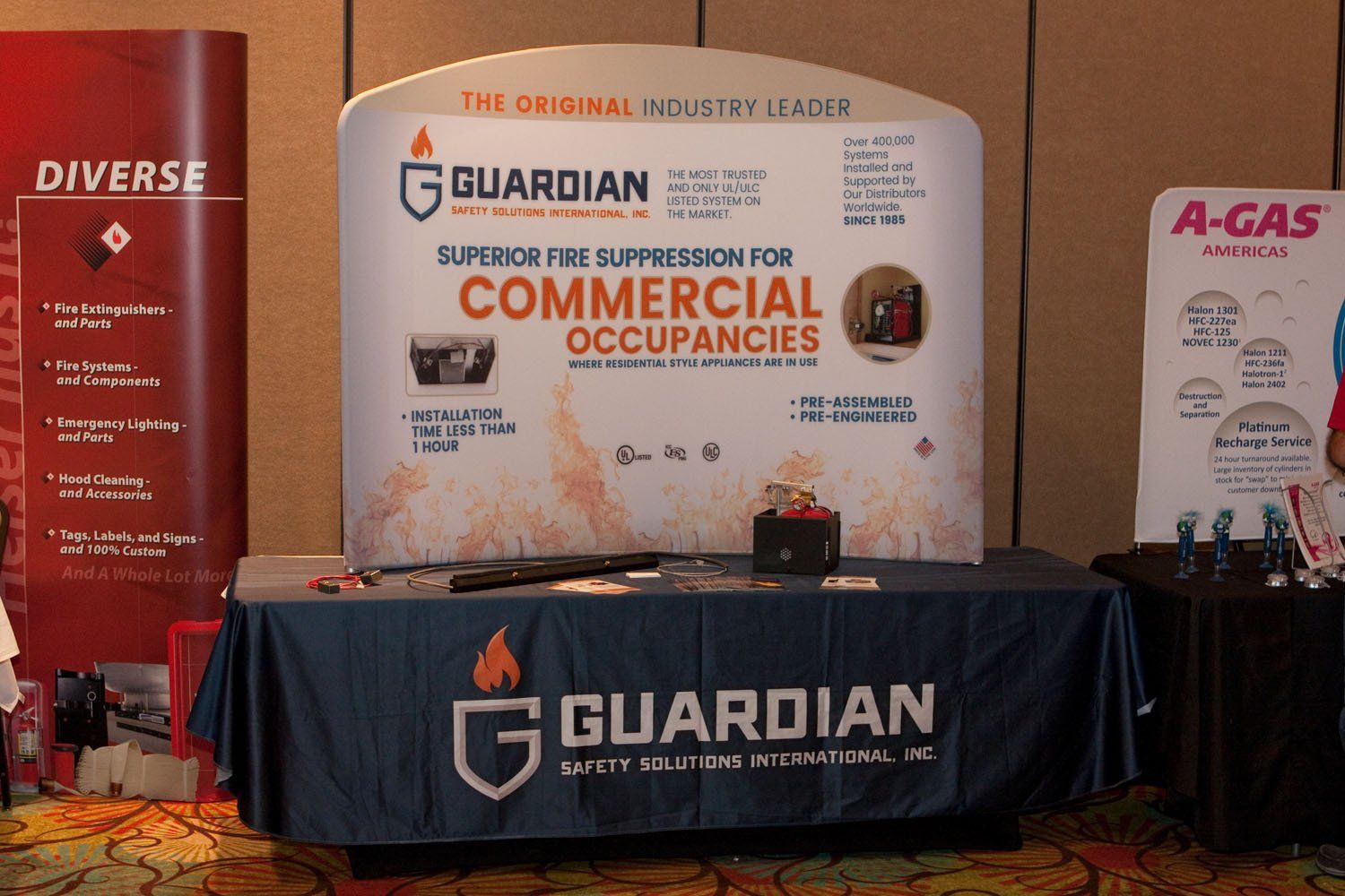 A table with a sign that says guardian on it