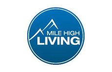 A blue circle with the words mile high living on it