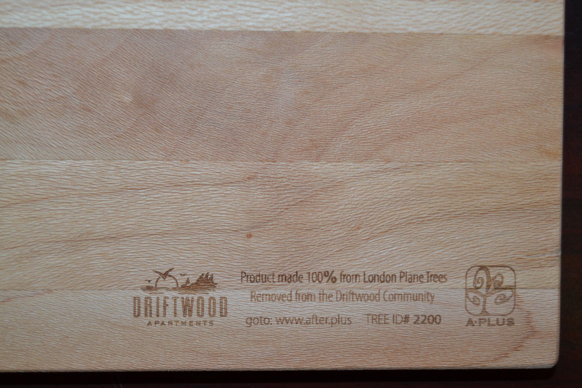 Close-up of a wooden board branded with 