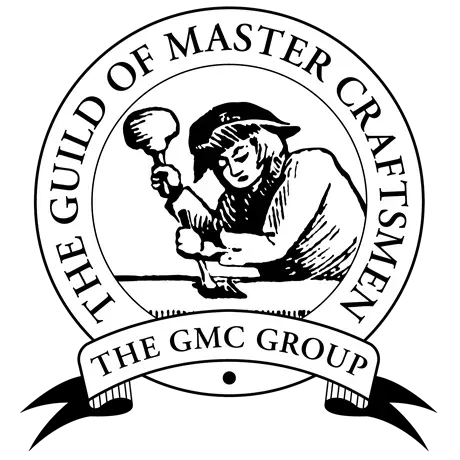 Black-and-white GMC Group logo with a craftsman and the text “The Guild of Master Craftsmen”