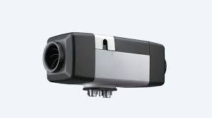 Compact black and silver security camera mounted on a bracket, angled forward.