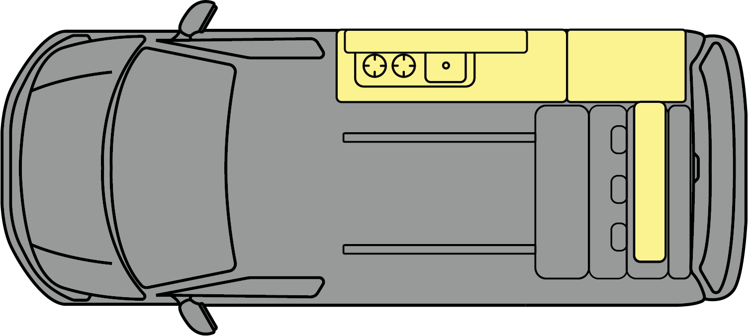 Top-down view of a gray car with a yellow roof sign and rear-mounted cargo rack.