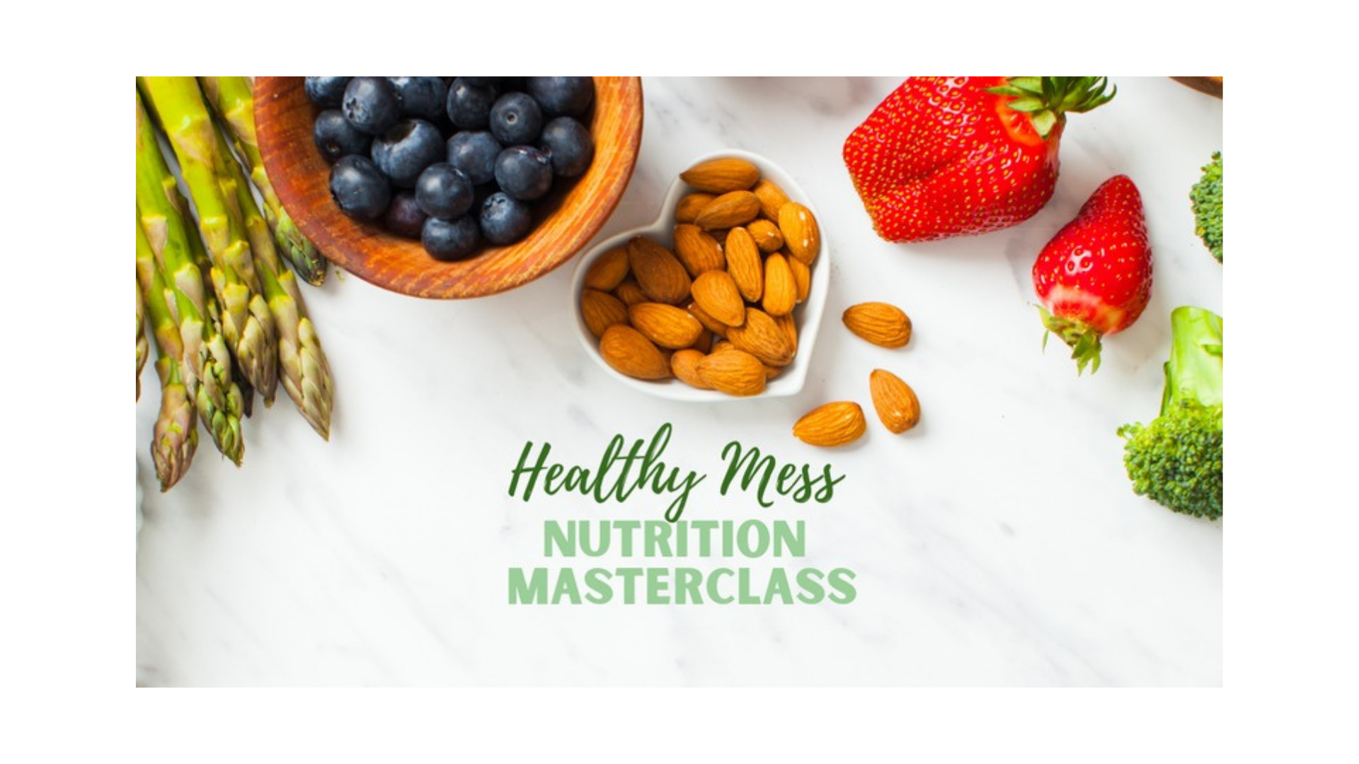Healthy eating masterclass advertisement: asparagus, blueberries, almonds, strawberries, broccoli on white surface.