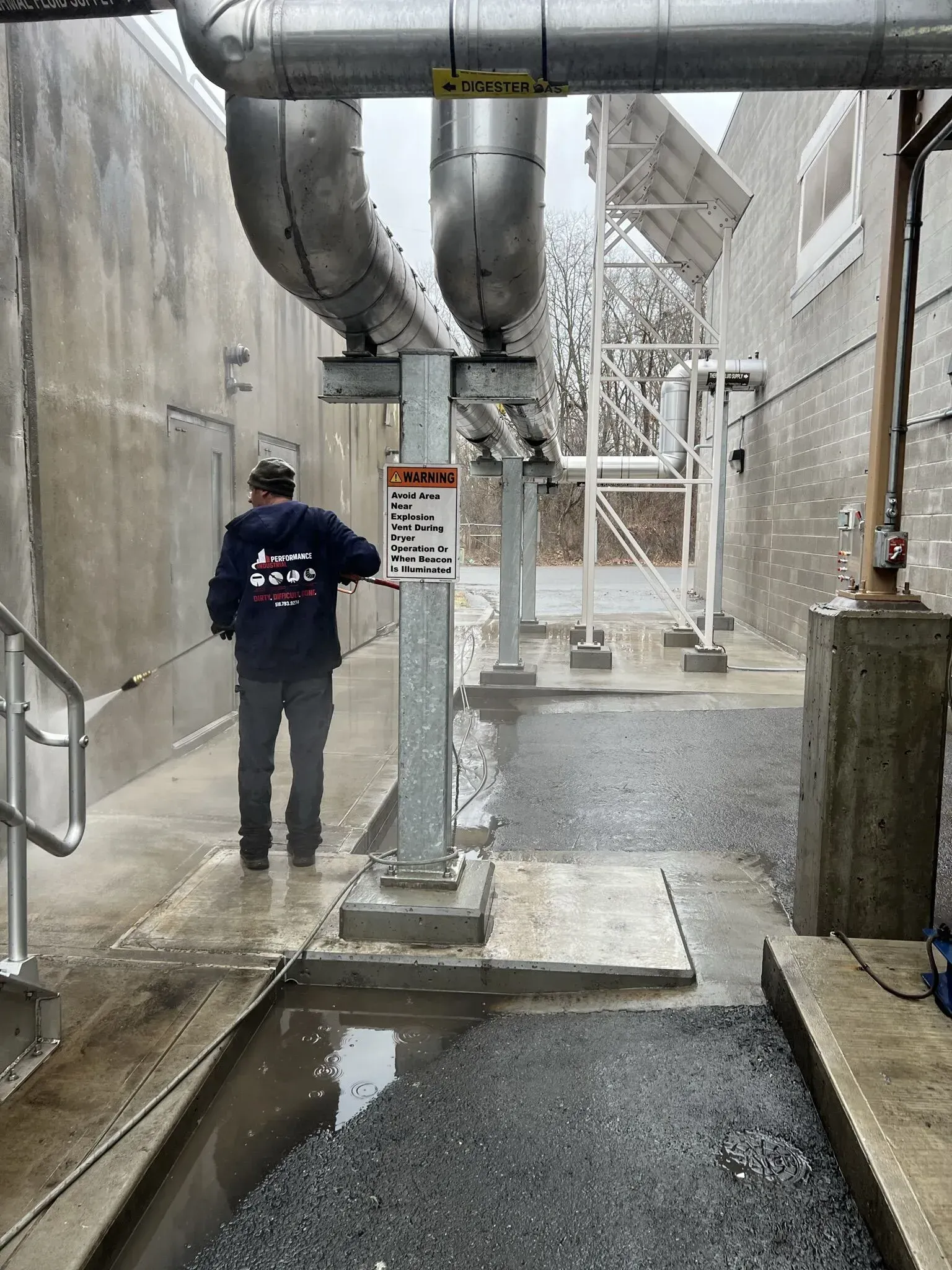 Man IsCleaning A Pipe | S. Glens Falls, NY | Performance Industrial