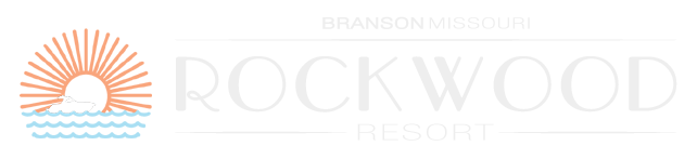 Rockwood logo with sunrise over waves in orange and blue