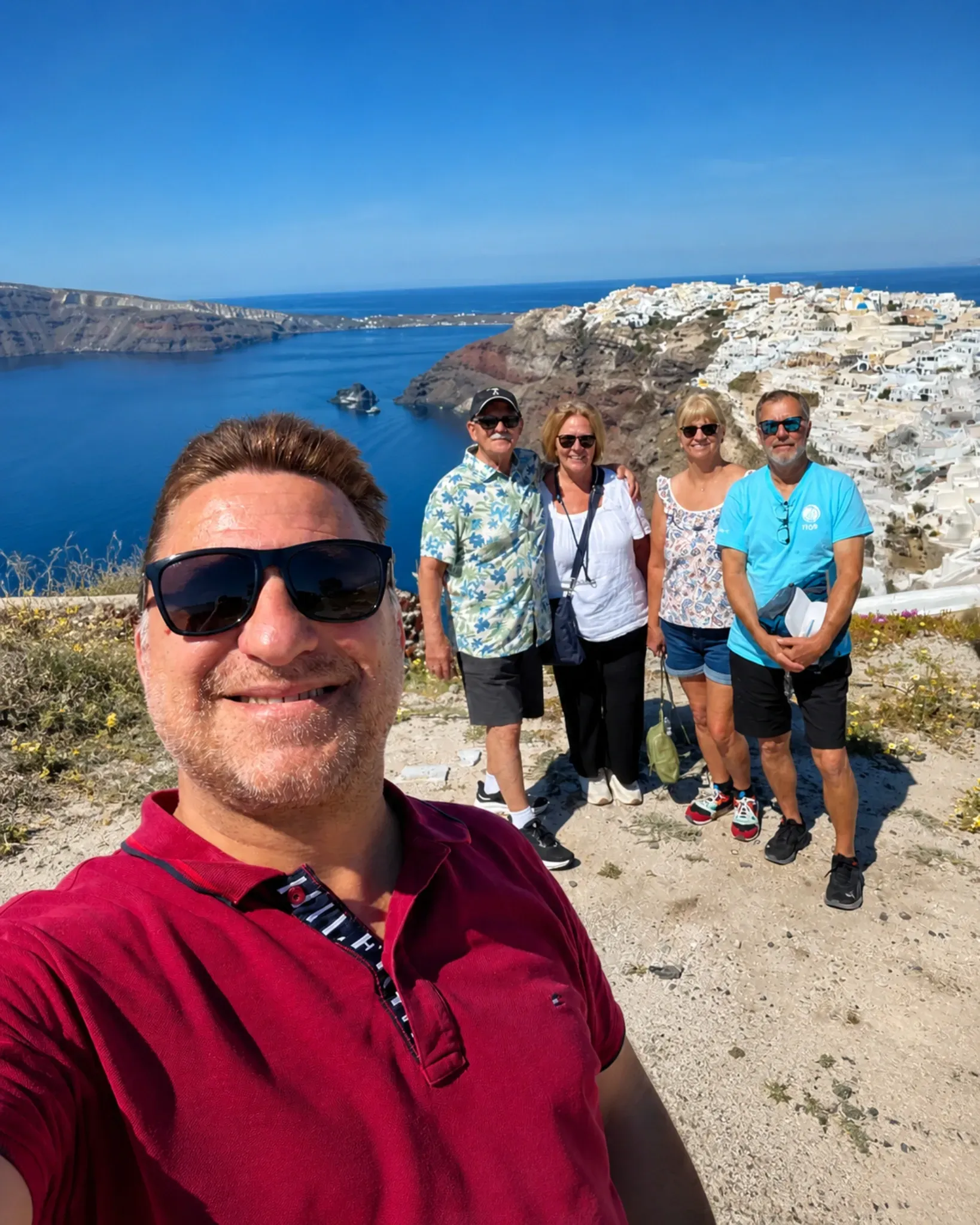 Kostas Boumis with private tour guests in Santorini