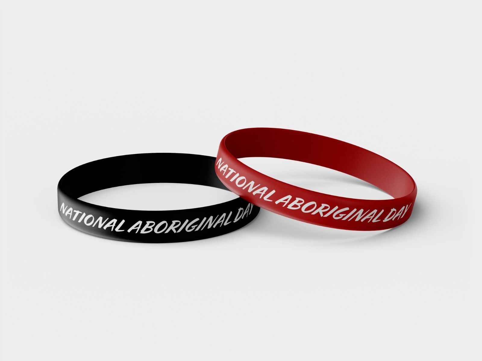 Land Back Movement black and red promotional silicone bracelets