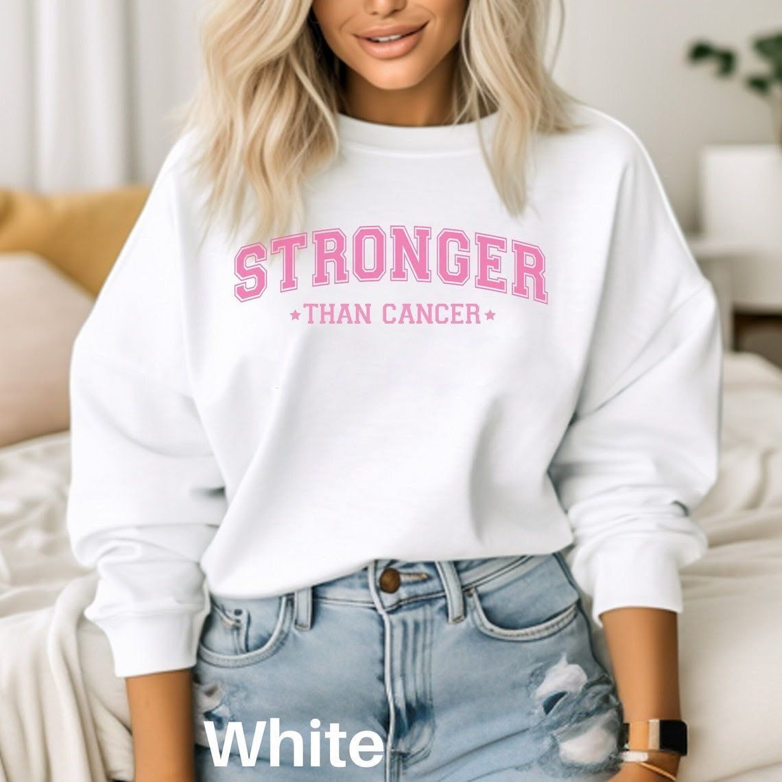 Woman in white sweatshirt with
