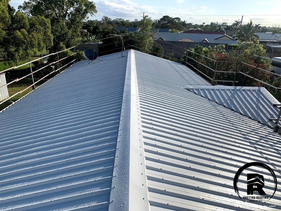 An Elevated View of a Newly Installed, Silver Corrugated Metal Roof — Rhettro Roofing Industry in Taroomball, QLD