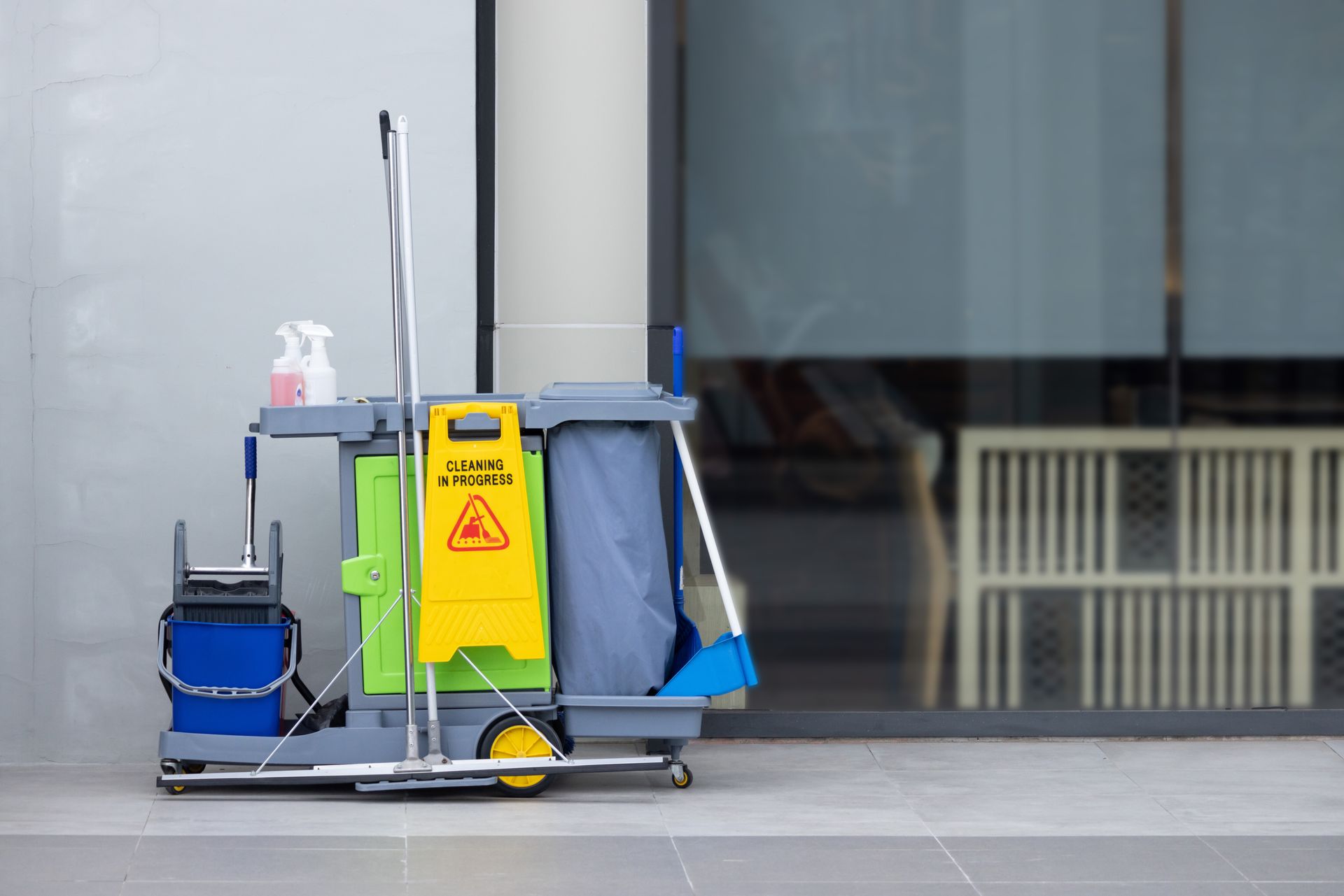 A cleaning trolley with a sign — Port O' Call Cleaning In Cannon Valley, QLD