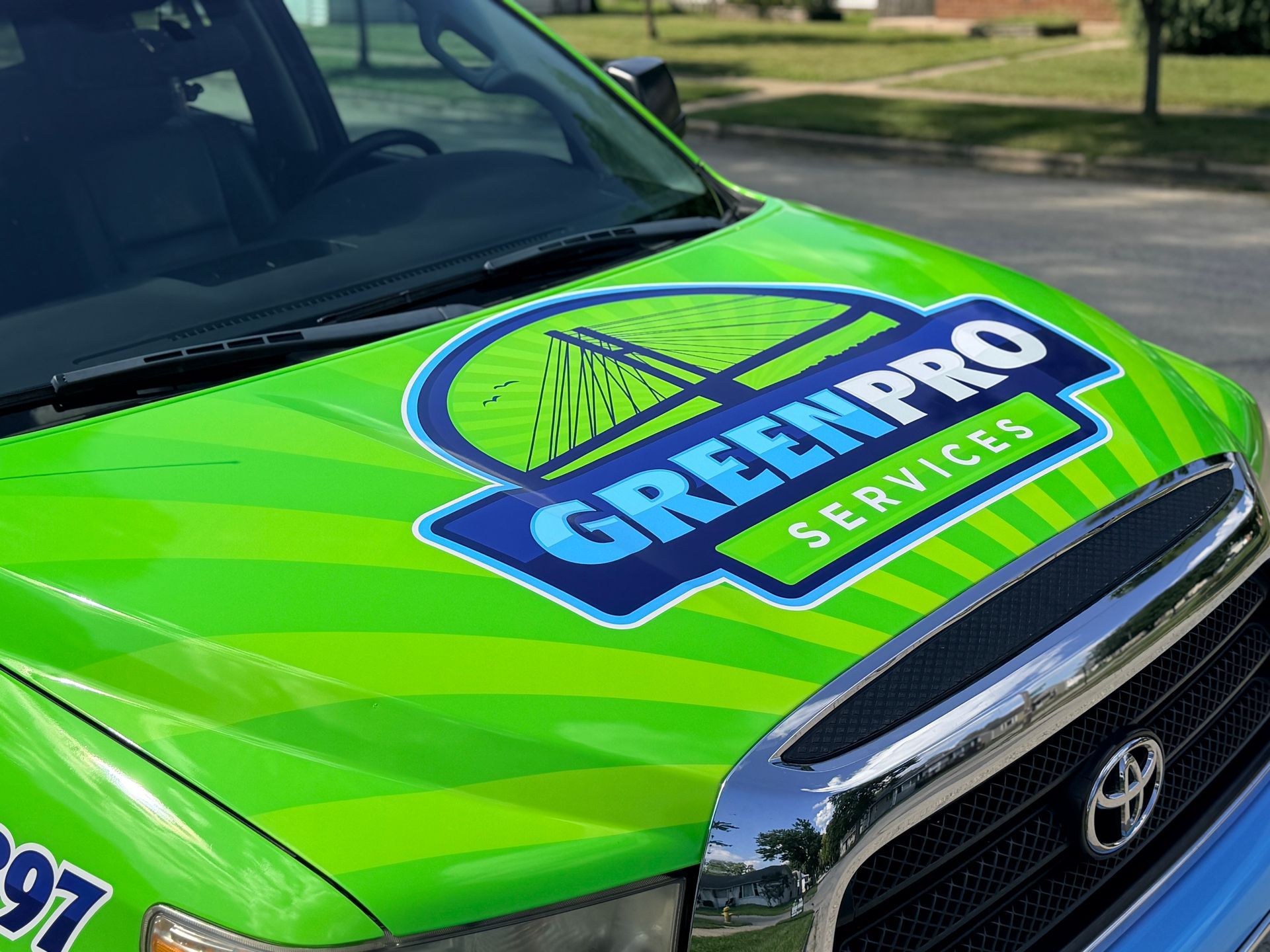 Newly purchased Green Pro Services 2007 Toyota Tundra work truck wrapped for roof cleaning and house washing in Kankakee, Illinois