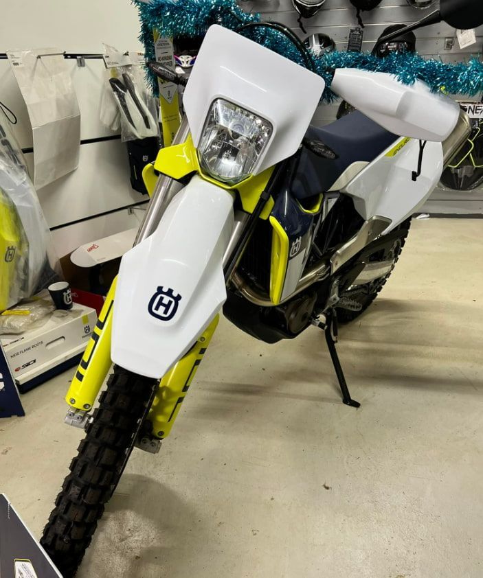 A Yellow And White Motorcycle With The Letter H On The Front — Extreme Motorcycles In Atherton, QLD