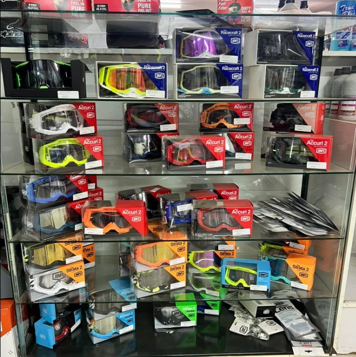 A Display Case Filled With Many Different Types Of Goggles — Extreme Motorcycles In Atherton, QLD