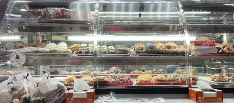 Bakery display case from Clocktower Treats inside the convenience store at the TA Janesville Travel Center.