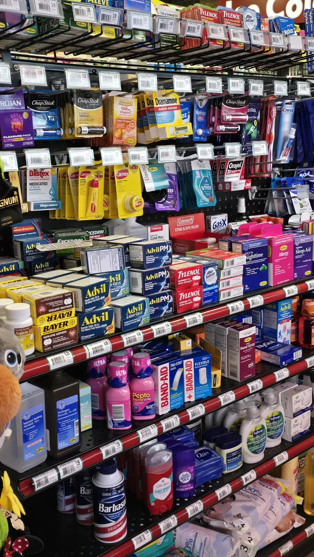 TA Janesville aisle display of assorted OTC medicine and personal care items