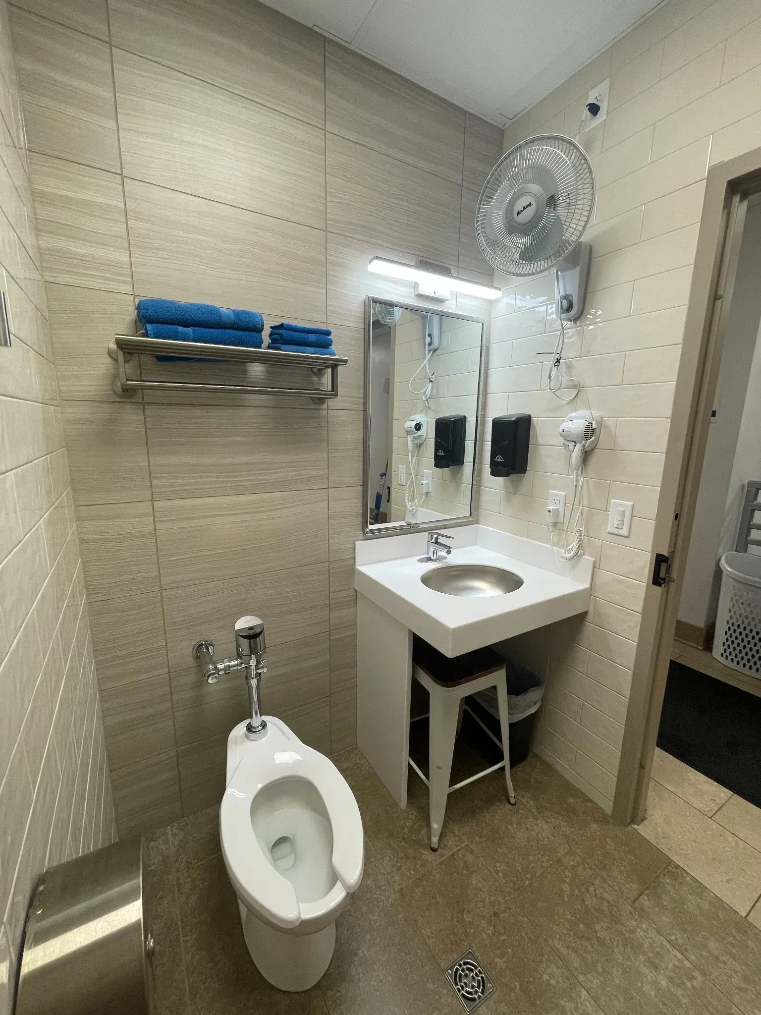 Private driver shower room with restroom and fresh towels at TA Janesville