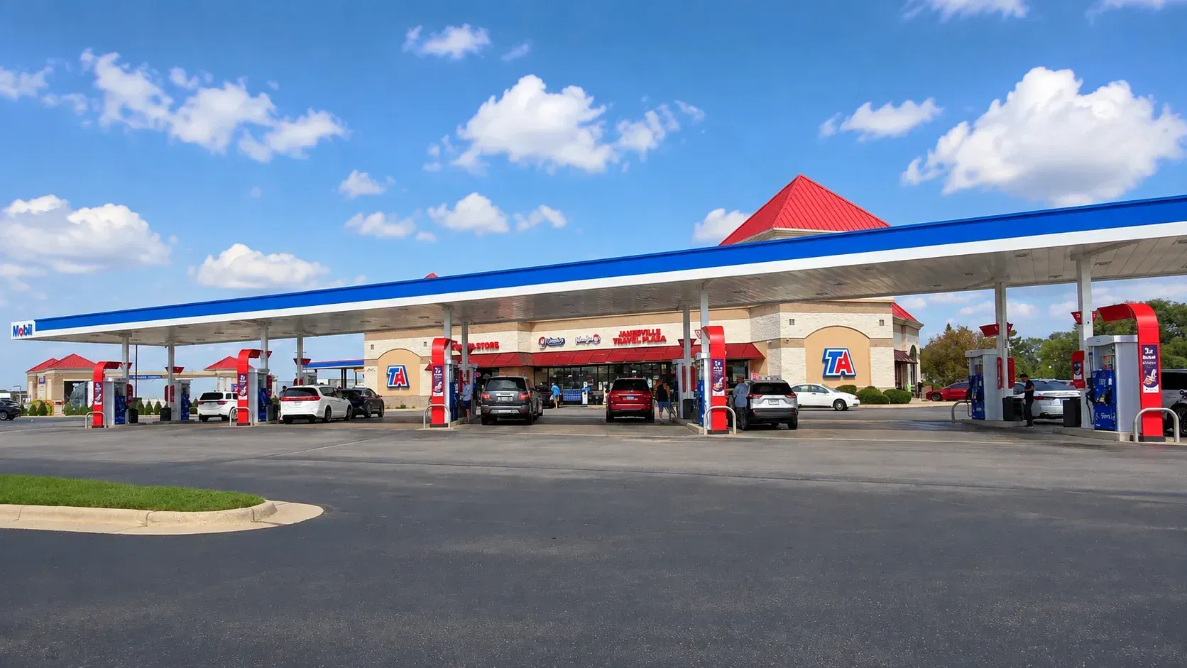 Exterior view of TA Janesville Travel Center with fuel pumps near I-90 and I-39 in Janesville, Wisconsin