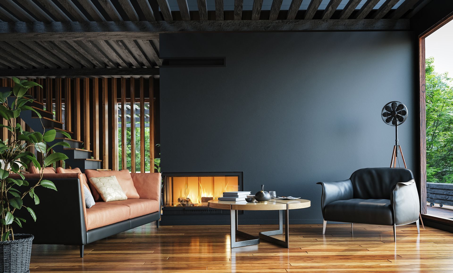 Salon moderne avec canapé orange, fauteuil noir, cheminée et parquet.
