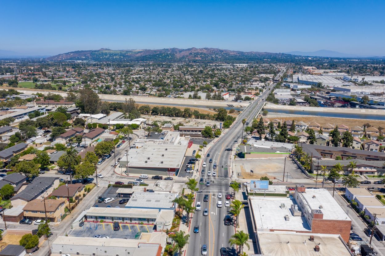An aerial view of a city with a lot of buildings and roads.