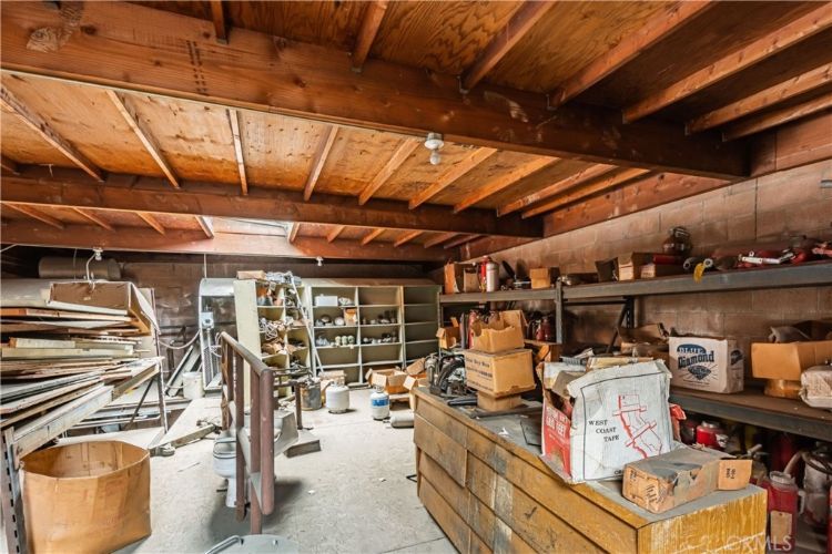 A warehouse filled with lots of boxes and shelves.
