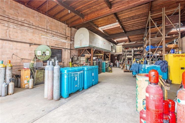 A large warehouse filled with lots of gas cylinders.