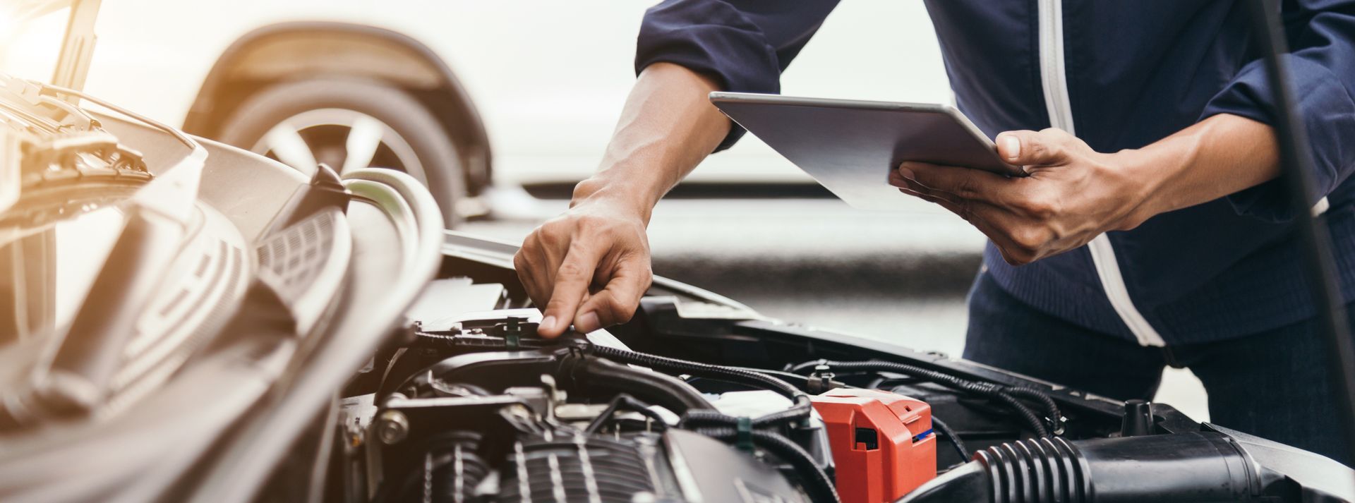 Mechanic Diagnosing Engine | TRC Automotive