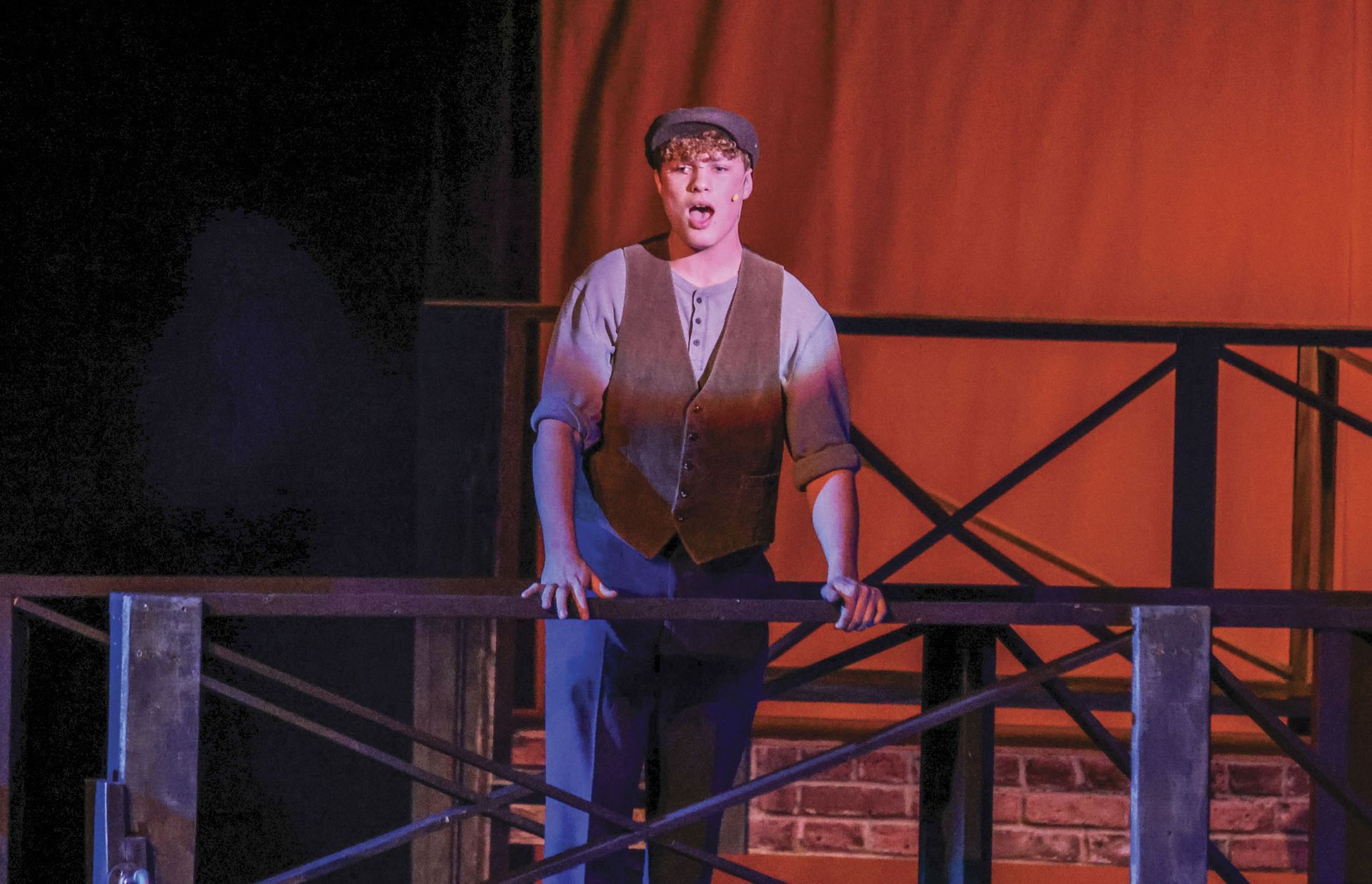 Gabe Van Nice, performing during Newsies